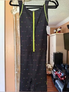 NEW with tags, Nike Air Dri-Fit  women’s one piece swim shorts.